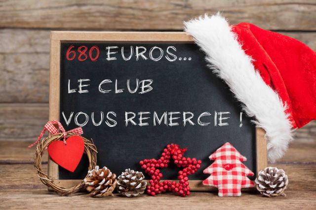 Thank you message on slate with chirstmas decorations on wooden table